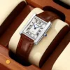 Silver shell brown ribbon