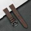 Bande marron foncé, boucle noire.