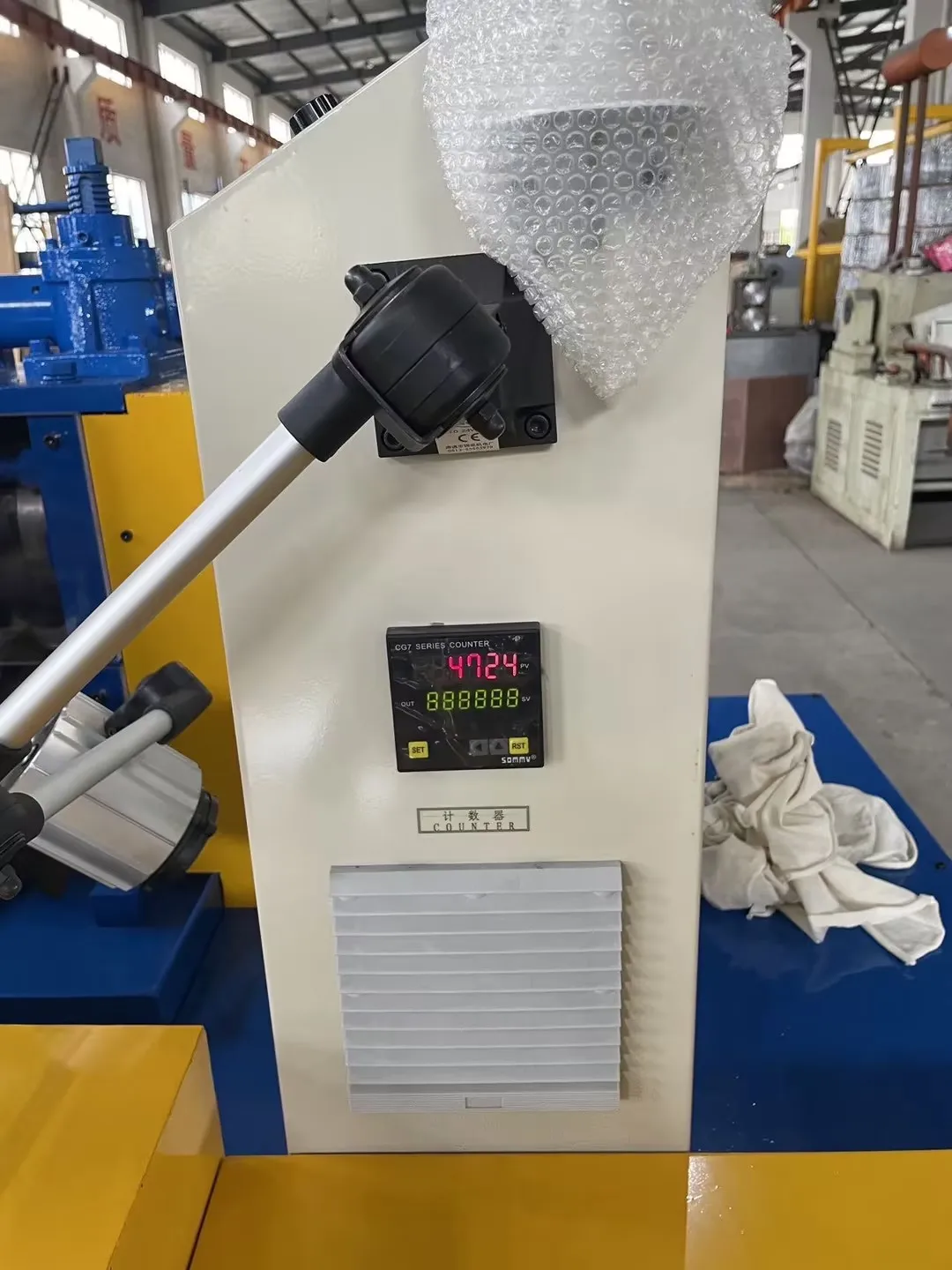 BOBO Machine wire flattening machine / wire band making machine shown in a detail photo for this news article