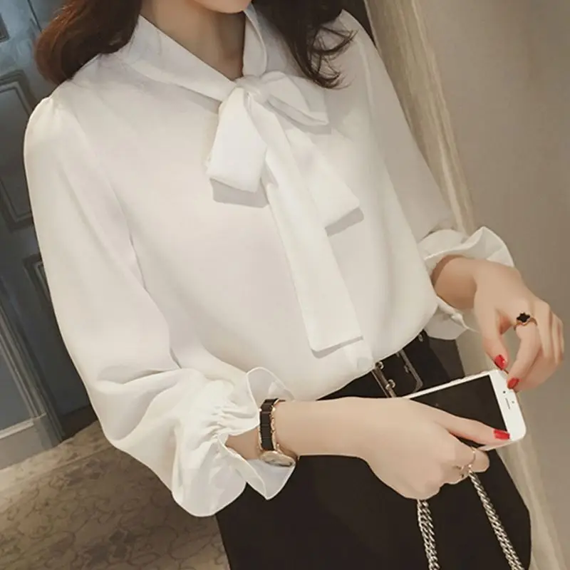 white blouse with tie bow