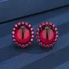 Black Gold red corundum stud earrings