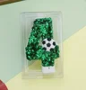 Candela numero 4 a forma di pallone da calcio