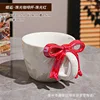 Pearlescent glaze red bow mug