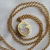 Collana con pendente delfino bianco in oro