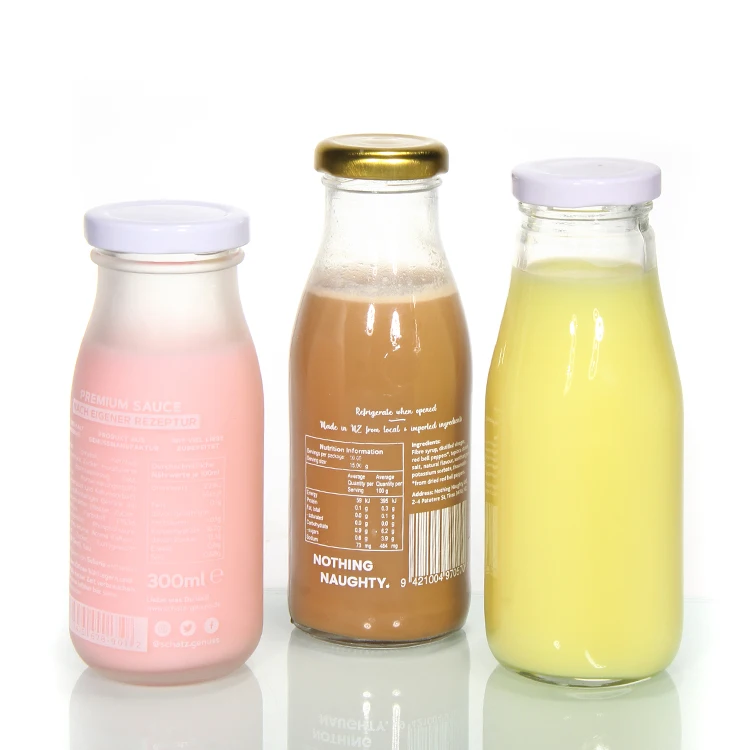 Stocked Cheaper Price Round Clear Milk Bottle Glass for Juice Beverage Packaging