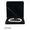 Boîte réglée de grands bijoux noirs