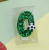 Candela numero 0 a forma di pallone da calcio