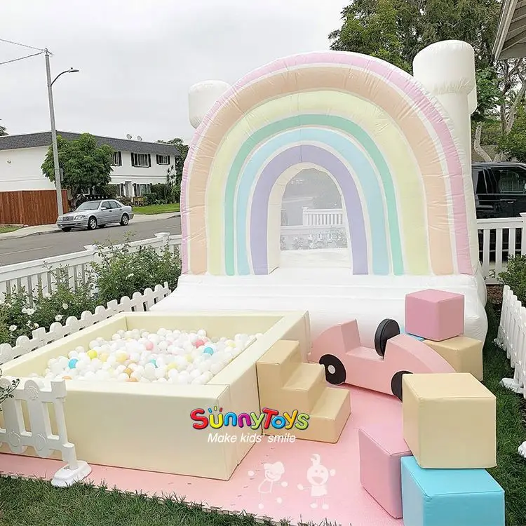 Rainbow pastel bounce house inflatable bouncer wedding party hire