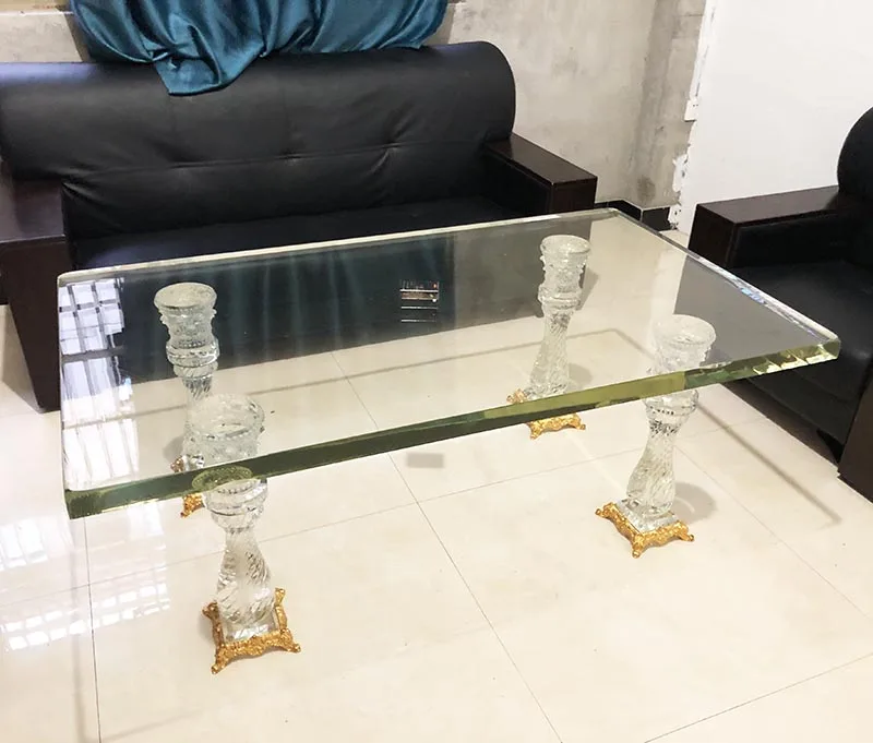 Стеклянный журнальный столик Adel с ножками из хрустального стекла