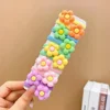 10 pezzi di fiori rosa (confezione OPP)