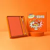 Juego de bolígrafos y cuaderno naranja "Heatwave".