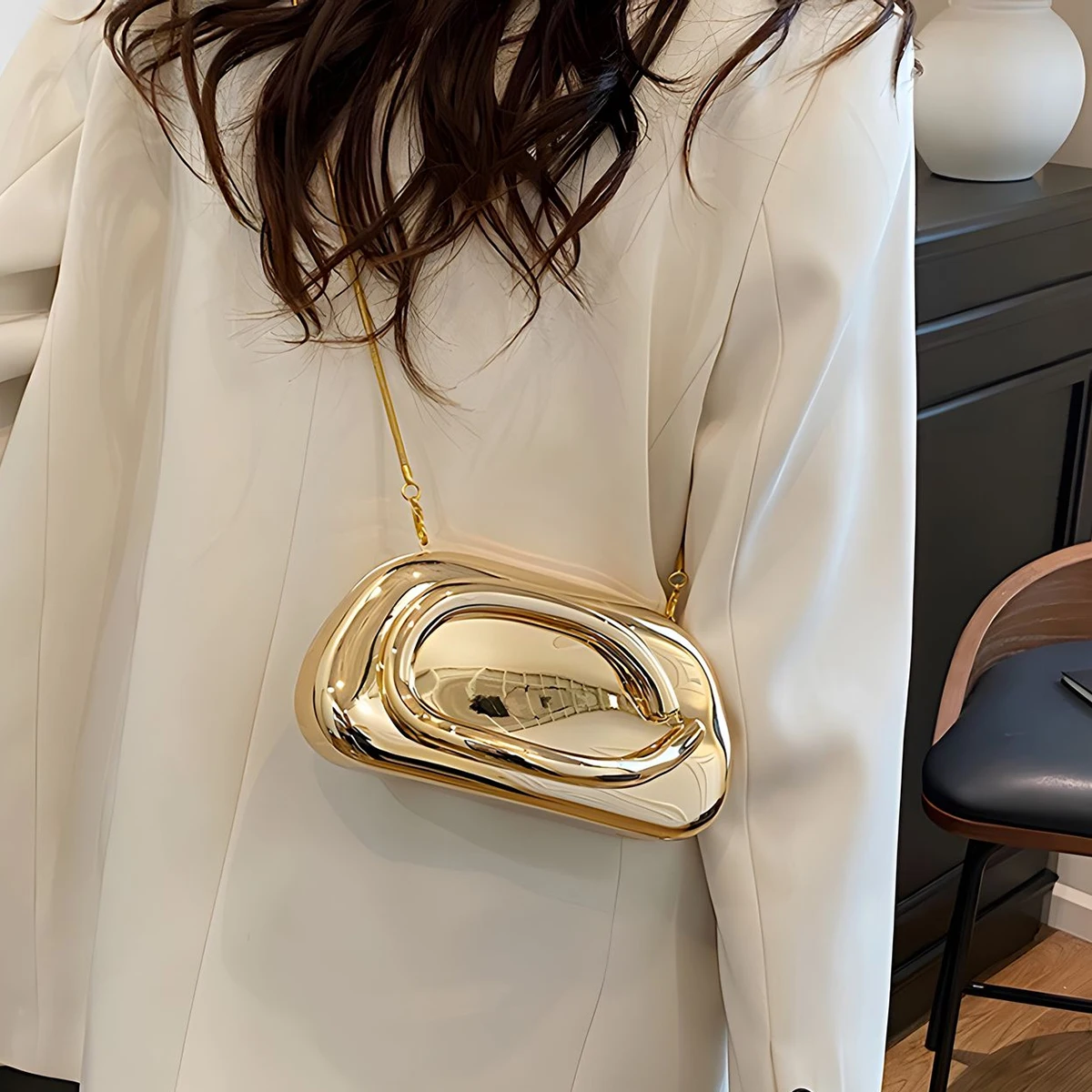 Carauana Festival Clutch held in hand