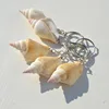 Porte-clés escargot à bouche blanche et pointe rose
