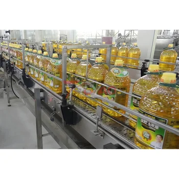Fully automatic rotary load cell weighing type sunflower oil filling machine edible cooking oil plant manufacturer