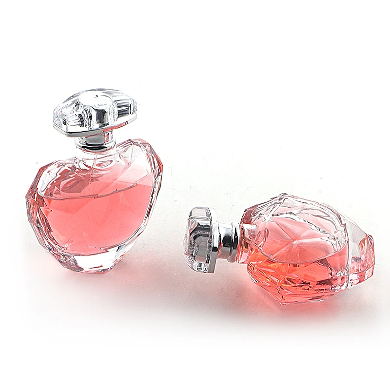 ユニークなデザイン 100ml ハート型香水ポンプボトル クリスタル香水蓋