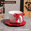 Pearlescent glaze red bowknot cup and saucer set