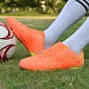Orange Turf Cleats