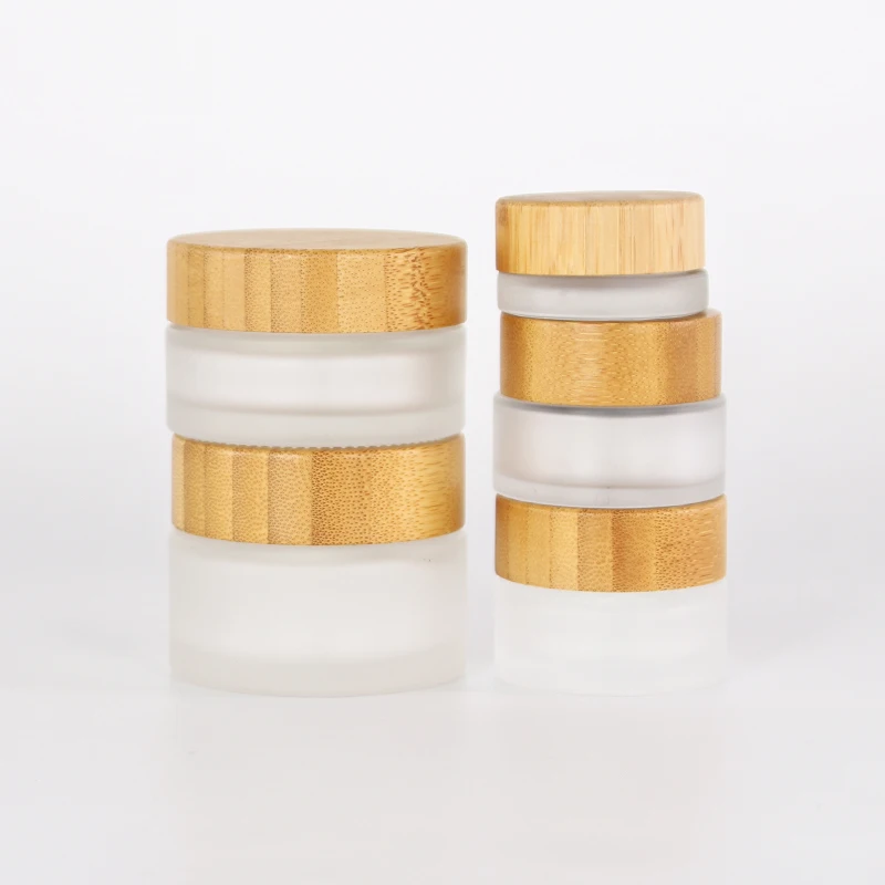 Hot selling natural 100g 50g 30g 15g 5g engravable frosted glass cosmetic facial cream jar with bamboo lid