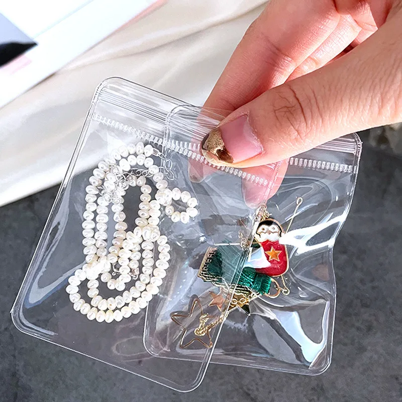 Custom Small Jewelry Packaging Clear Zip Plastic Bag Matte Cute Zipper Bag For Earring Reusable Logo PVC Mini Ziplock Pouch Bag supplier