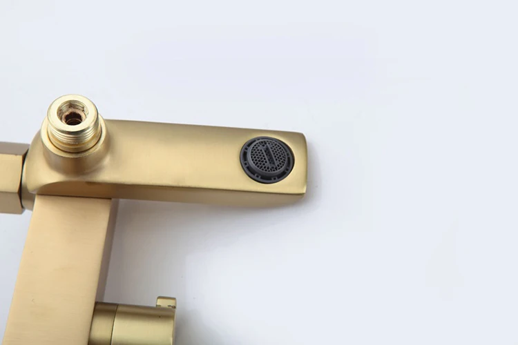 Juego de mezclador de grifo de ducha de lluvia expuesto montado en la pared de latón dorado para baño