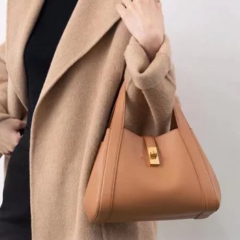 Niche design leather basket bag 2023 texture hand-held bucket bag fashion women's bag