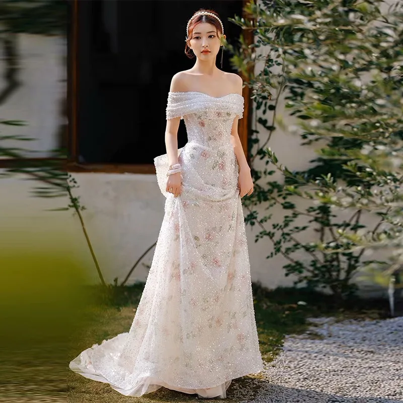 extra long white maxi dress Embellished Long Sleeve Backless Maxi Dress in White - 8 main image 0