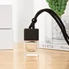 transparent bottle with black cap