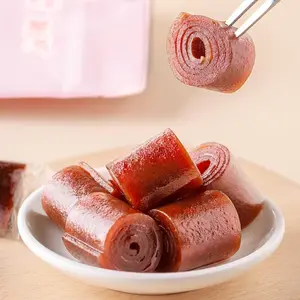 Iron Hawthorn Roll a Nostalgic Snack with Preserved Hawthorn Rolls in Separate Small Bags China Candy Sweet Snacks Hawthorn Roll