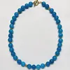 Collana in oro e apatite
