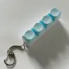 4 teclas azul claro
