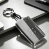 Renault A white key case with gun-style quick clip