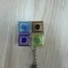 Cubo colorato a quattro pulsanti