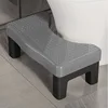 Taburete de baño gris (con patas negras)