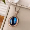 Blue pointed crystal pendant with chain