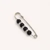 5.5cm aiguille argent perles noires