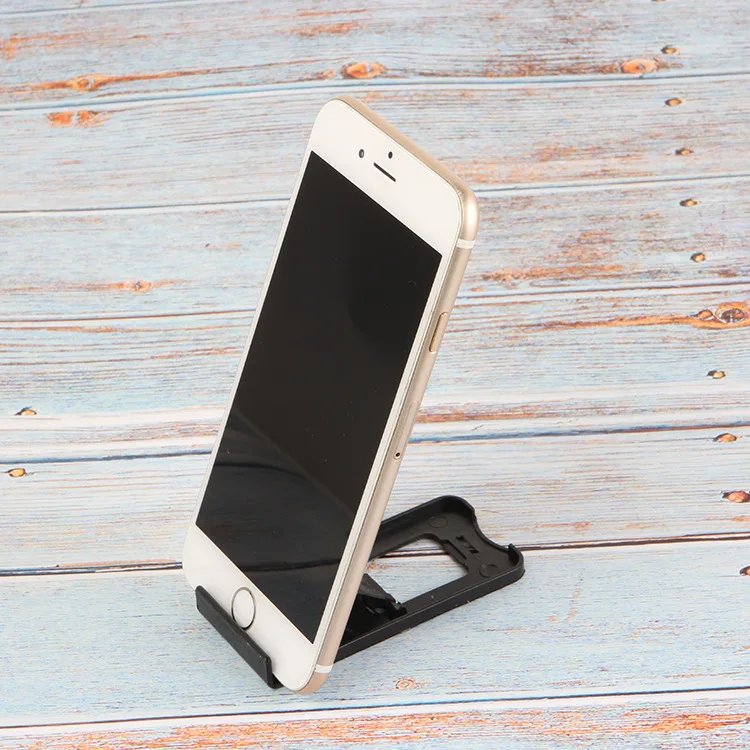 Foldable universal adjustable mobile phone holder