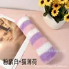 Almohada de peluche rosa, morada y blanca (con hierba gatera)