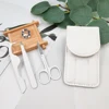 White eyelash tweezers set