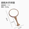 Walnut wood fishtail mirror, small