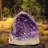Purple amethyst geode cluster