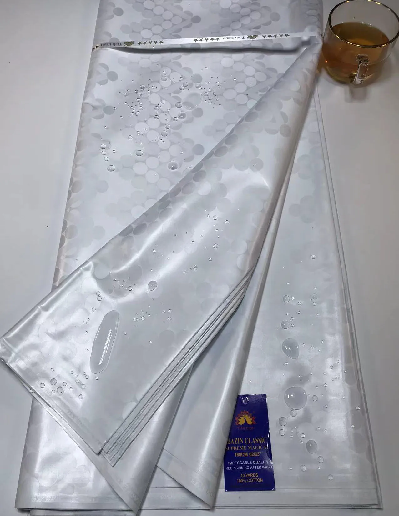 批发新到非洲锦缎沙达巴赞里奇几内亚锦缎面料可持续刺绣女装蕾丝动物| Alibaba.com