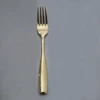 Fourchette de table dorée
