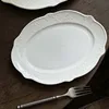 assiette blanche de 12 pouces