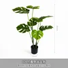 Planta de monstera artificial de 8 hojas en maceta.