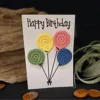 Biglietto d'auguri di compleanno con palloncino di colore rosa