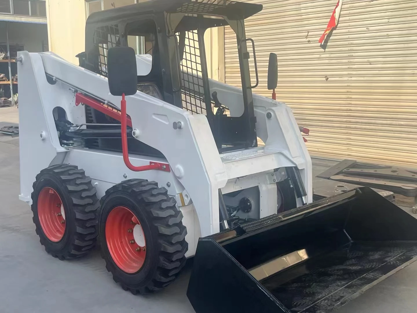 china cheap mini skid steer loader with track hydraulic control wheel skid steer loader attachment with 4 in 1 bucket manufacture