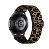 Black and brown leopard on yellow background
