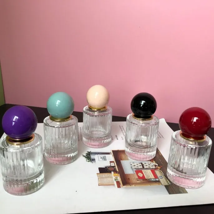 product new 30ml 50ml high end eau de parfum corrugated clear perfume bottle vertical strip glass spray bottle with ball cap-27