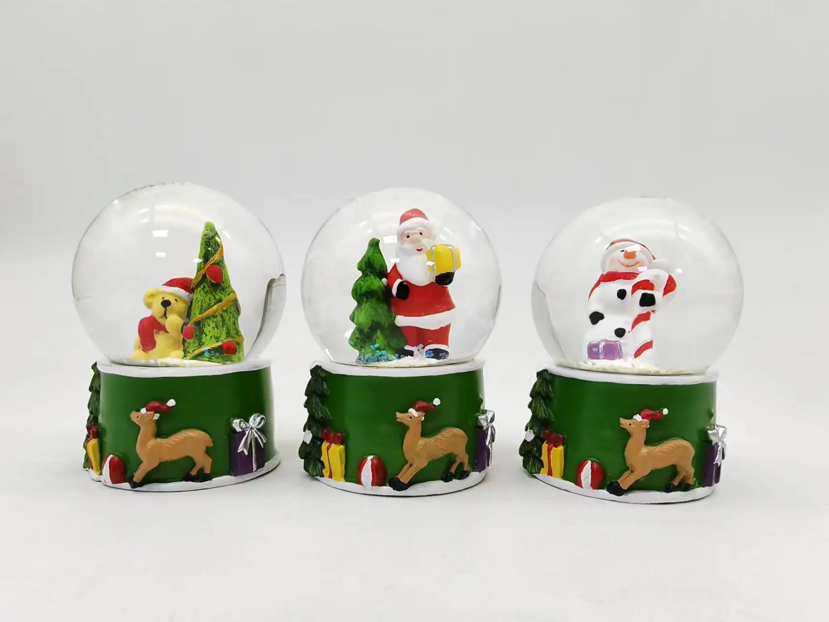 Factory Direct Sell Green Base Water Globe Christmas Water Transparent Glass Ball With Resin Xmas Figurine Inside Creative Gift supplier