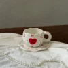 Tazza con fiocco a forma di cuore rosso ciliegia 300 ml e piattino